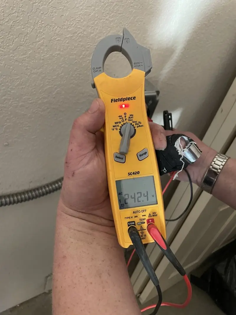 Voltage testing with clamp meter during Whole House Surge Protector in Lanett